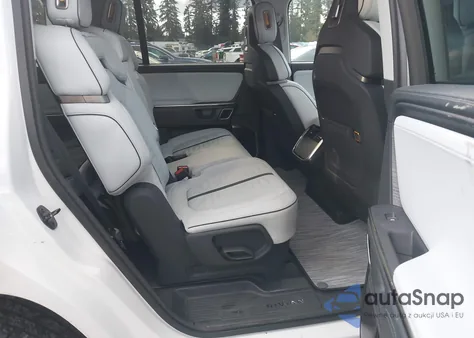 2023 Rivian R1S Adventure z USA, uszkodzony, nr VIN 7PDSGABA2PN009823